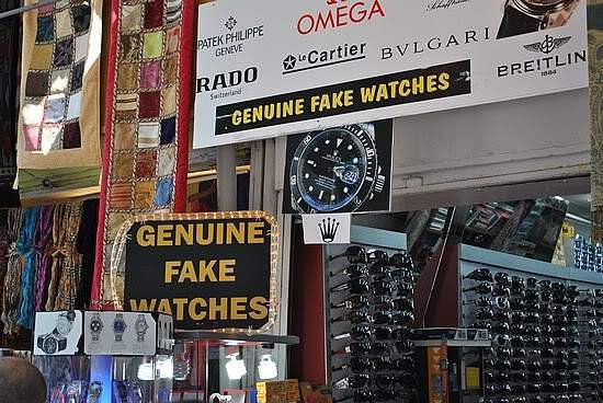 ai322.photobucket.com_albums_nn423_gfrz_Kos_11284659217genuine_fake_watches.jpg